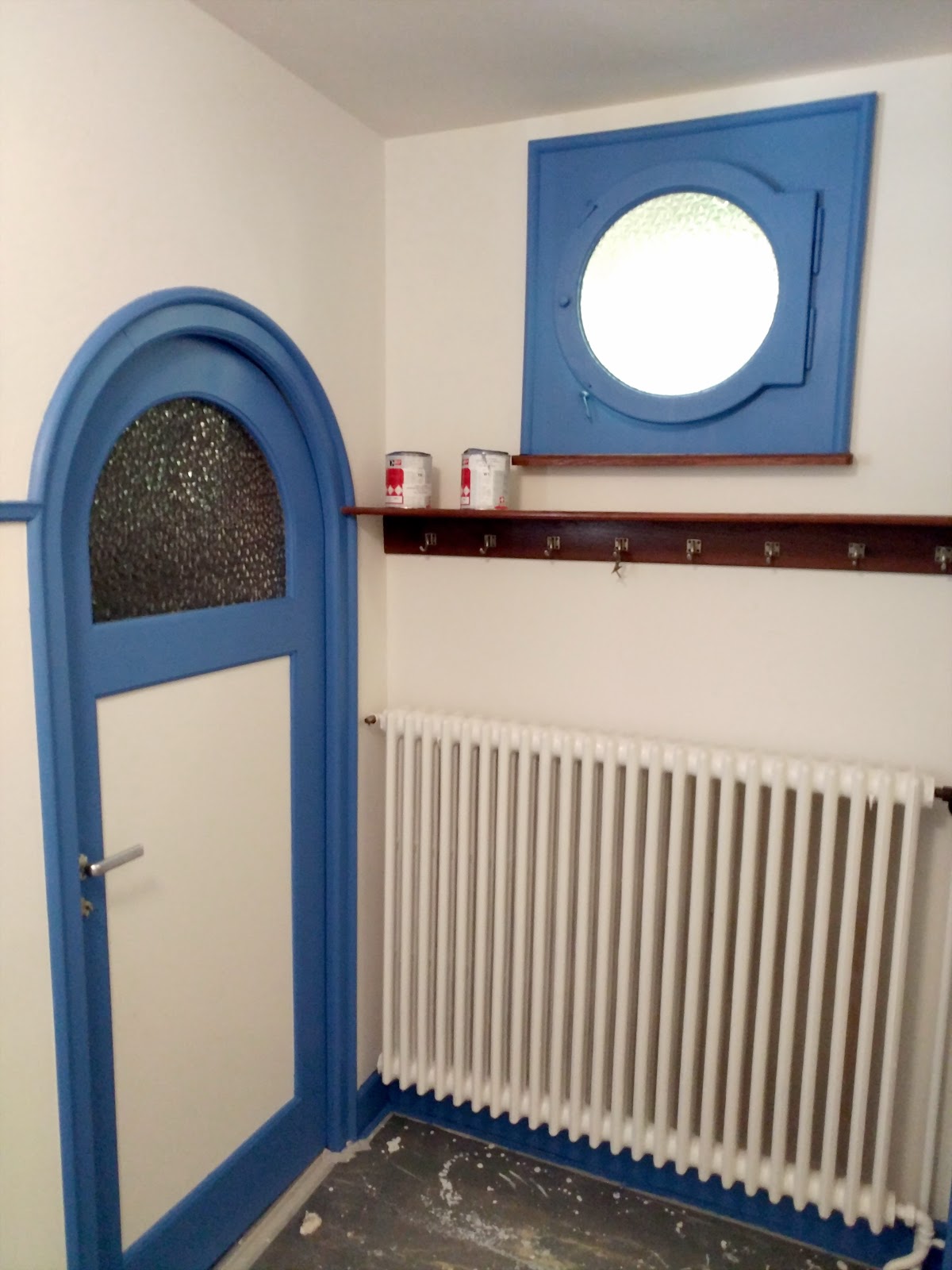 Mur repris derrière un radiateur